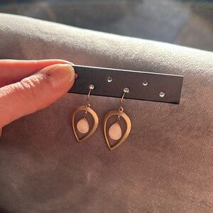 Gold tone metal and pale pink stone hanging earrings